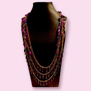 Show-Stopping three layers of purple cascading beads with gold chains